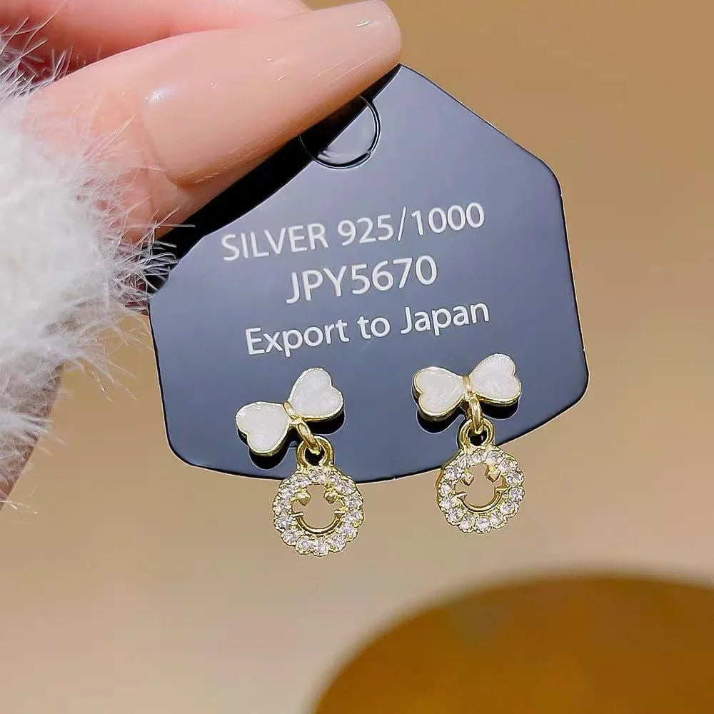 Elegant Bow Hollow Circle Drop Earrings – Each